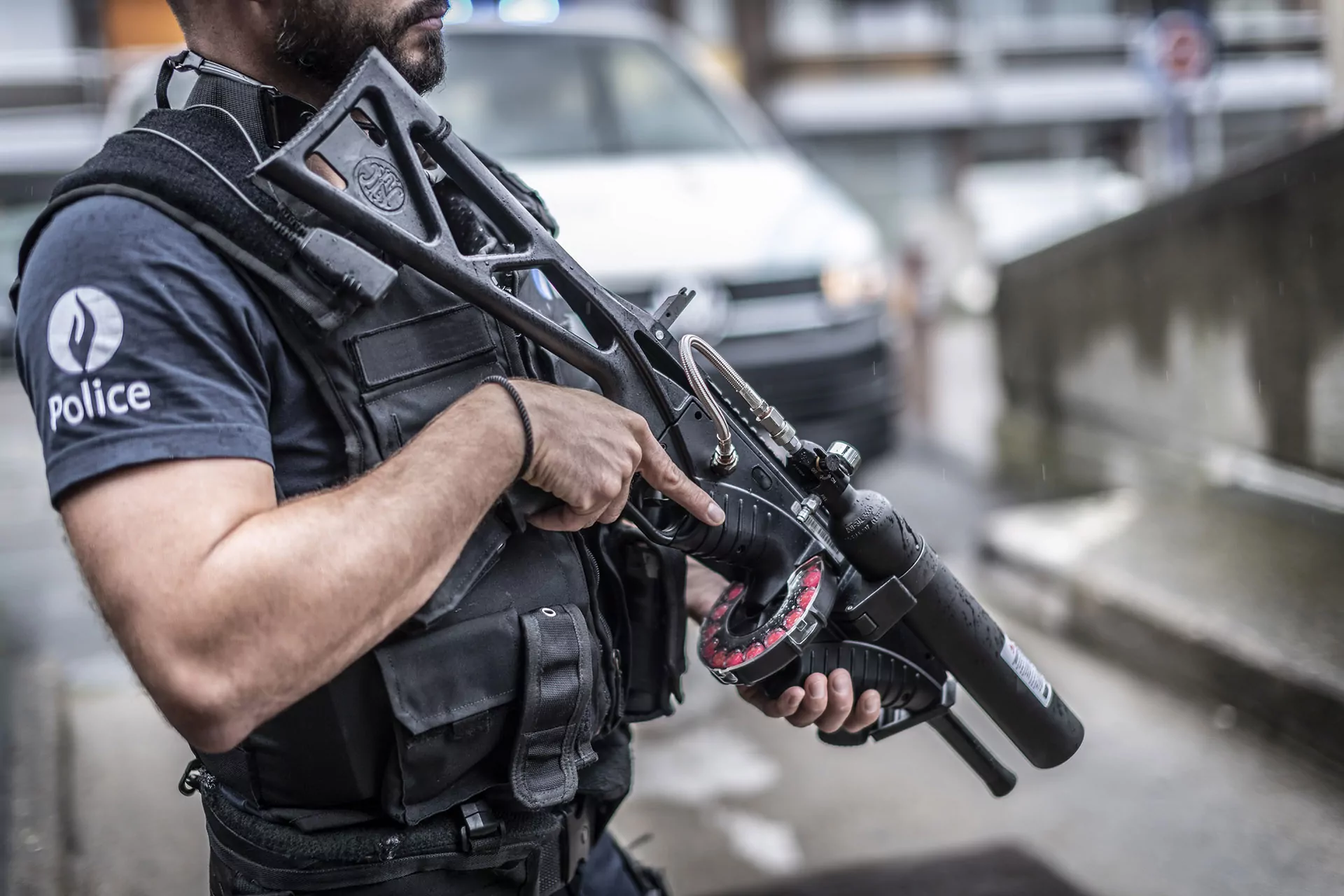 police officer holding an fn 303 