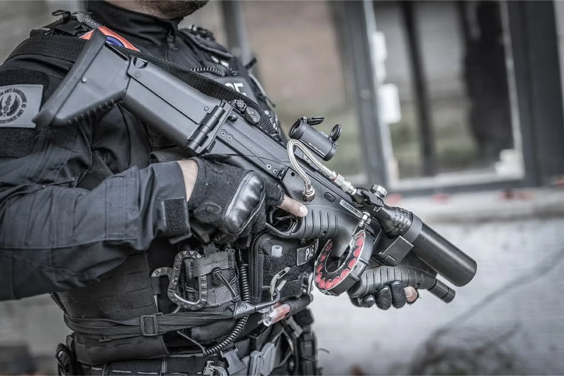police officer holding a fn 303 tactical